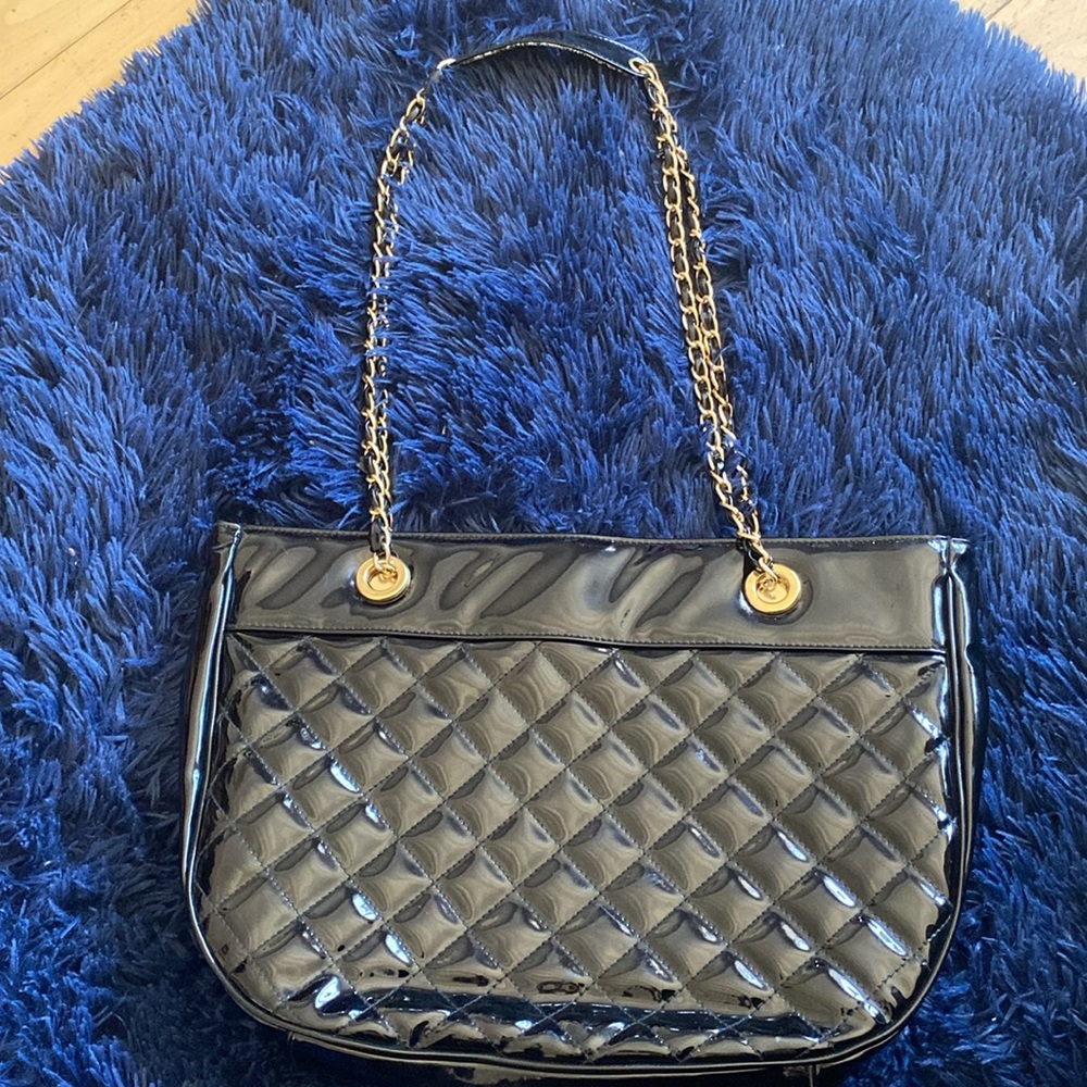Cute black patent (plastic?) purse with gold coloured chain